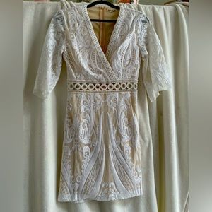 Brand new size M dress. Lots of detail with beading and sequins.